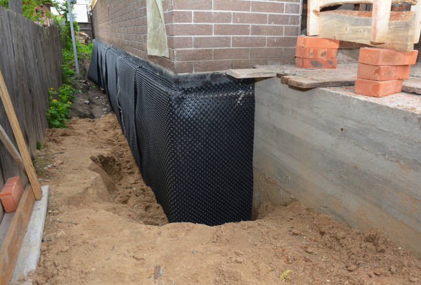 SJ Waterproofing Pros technician performing targeted Interior Drainage System assessment in Lebanon, OH